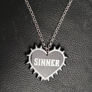 "Sinner" spiked gilttery heart 2-sided black and white gothic necklace